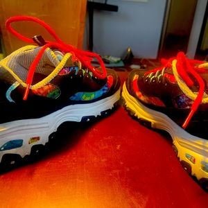 Rainbow color Skechers size 9.5 wide.